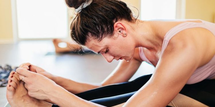 Heated workouts and hot yoga are all the rage. But are they actually good for you?