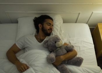 Adults can sleep with stuffed animals, too. It might even be a good thing, experts say