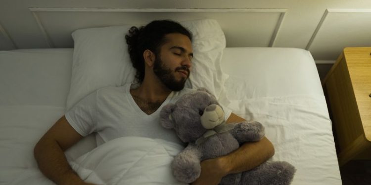 Adults can sleep with stuffed animals, too. It might even be a good thing, experts say