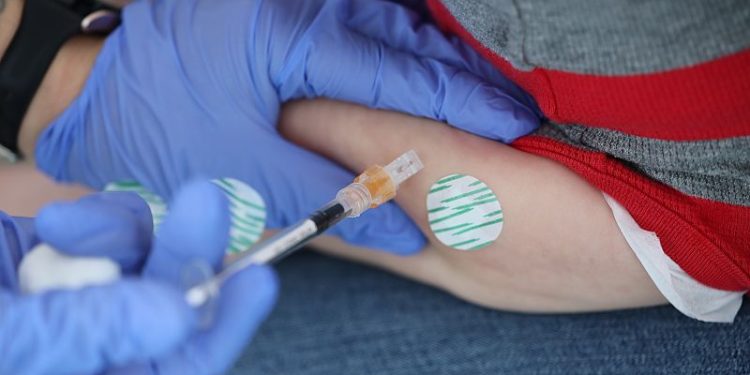 Top FDA vaccine official rejected broad use of Covid-19 shots, documents show